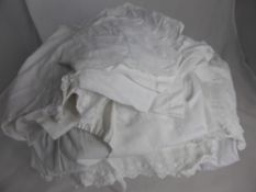 Collection of assorted Victorian lace embroidered children`s christening robes and other items.