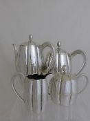 Getruf German Solid Silver Coffee and Tea Set , the set comprising tea pot, coffee pot, hot water