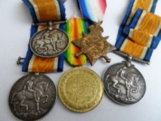 Three Great War Medals to J C Probst, G Wrighton and L F W Slattery together with a 1914 / 15 Star