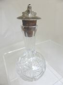 Cut glass vinegar bottle, the Birmingham hallmarked top depicting a fox head dated 1972/73.