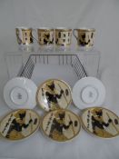 A Fathi Mahmoud Limoges coffee set comprising six saucers and four cups.