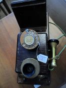 Mahogany Wall Phone with bakelite mouth piece, brass ear piece and metal bell ring.