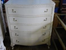 Olympus Chest of Drawers the cream and gilded Serpentine fronted chest with five drawers.