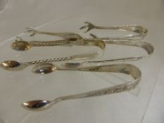 Two London Solid Silver Sugar Nips together with three Birmingham hallmarked sugar nips. (5)