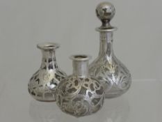 Two Cut Glass Silver Topped Cotton Wool Jars, Birmingham hallmarked together with a cut glass silver