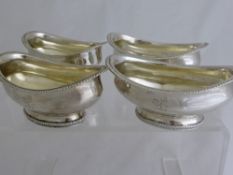 Four Silver Salts, the elliptical shaped salts having ribbon edge and footed base, engraved with