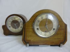 Garrards Oak Art Deco Mantle Clock the clock face with Roman numeral dial, complete with winder.