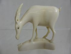 An ivory figure of an antelope, approx. 6 cms tall