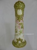 A Royal Worcester style spill vase having impressed shaped marks to base 2963 10 with daisy and leaf