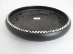 A Royal Staffordshire fruit bowl having a black and white edge.