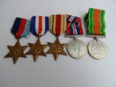 Second World War boxed 39 / 45 Africa (clasp missing), Italy Stars with War and Defence Medals