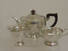 Solid Silver Tea Set comprising tea pot, twin handled sugar bowl and a cream jug, Birmingham