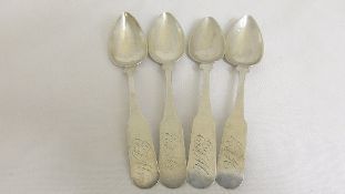 Four antique American solid silver grapefruit spoons, maker`s mark B & M approx. 75 gms.