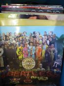 A collection of misc. L P records incl. The Beatles " Lonely Hearts Club " and " For Sale "