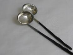 Pair of Georgian Miniature Pouring Ladles, the ladles on twisted ebony stem, London hallmark m.m