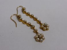 Edwardian Seed Pearl and Diamond Earrings, the drop earrings comprising six pearls terminating to