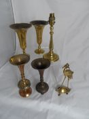 Miscellaneous collection of brass including a lamp base, candlesticks, vases, paperweights etc.
