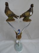 A collection of decorative bird figures, to include examples by Wade, Beswick, Coalport, Metzler &