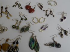 Miscellaneous collection of costume jewellery including earrings, brooches etc...