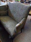 Circa 19th century salon sofa being in the Georgian style on cabriole legs