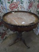 Antique marble topped occasional table being on a decorated centre column with three splayed feet