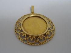 1902 Edward VII gold sovereign in a 9 ct gold mount, approx. mount weight 2.4 gms.