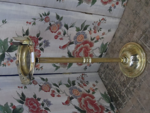 Vintage brass ashtray stand supported on a centre column with a round base, approx. 72 cms. high.