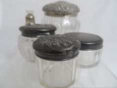 Miscellaneous collection of silver including silver topped perfume bottles and cut glass dressing