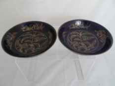 Two Chinese royal blue plates depicting ripened fruit, Chenghua mark to base, approx. 20 cms