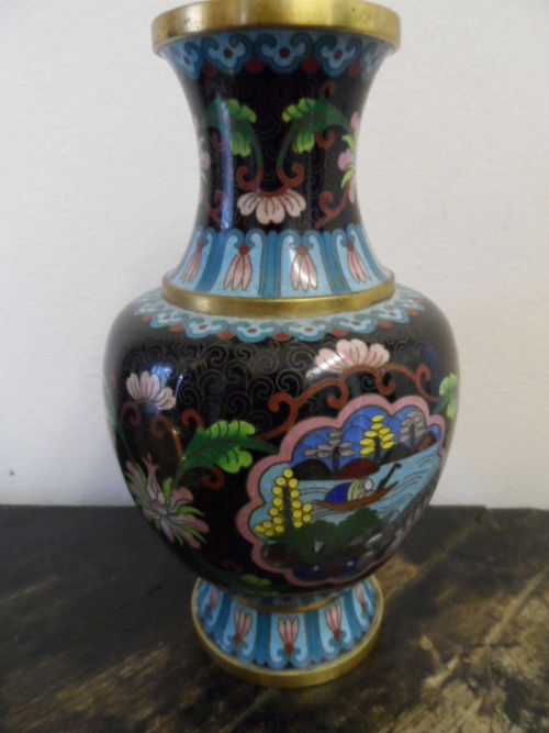 Circa 20th century oriental cloisonne vase, depicting a Pagoda and river scenes within shell