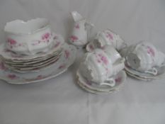 Ohme Hermann Elysee 19th century part tea service comprising six cups and saucers, milk jug, sugar