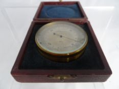 Vintage brass barometer, No. 1A  AJC 61/1 156, in the original box.