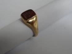 A lady`s signet ring being 9 ct hallmarked gold cornelian.