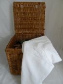 Wicker Picnic Hamper together with a lace table cloth and two woollen rugs.
