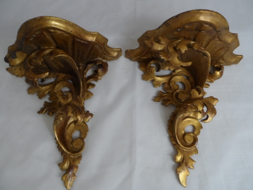 Pair of Continental wall sconces of gilded wood.