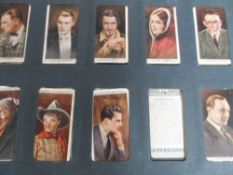 Cigarette cards contained in two albums incl. Wills and Players.