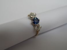 Lady`s 18ct sapphire and diamond three stone ring, diamonds 2x old cut approx. 35 pts each,