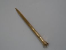 A 9 ct Gold propelling pencil being Birmingham hallmarked, mm C & C.