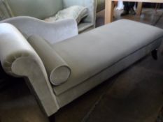 Contemporary Day Bed with tapered feet covered in a grey faux velvet.