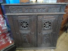 Antique Oak Corner Cupboard the cupboard with intricate carving - ships wheel decoration to each