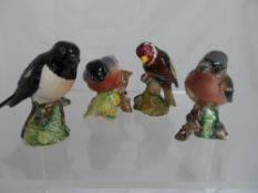 Four Beswick Garden Bird Figures, Bullfinch, Chaffinch, Goldfinch, Stonechat.