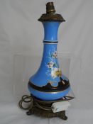 Victorian hand painted porcelain lamp stand on blue Ormolu base with floral decoration.