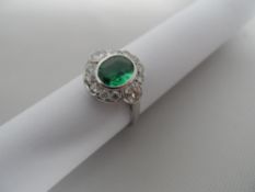 Art Deco style 18ct white gold emerald and diamond lady`s dress ring, set with 2 x 3.8mm diamonds at