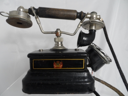 Vintage Belgian cradle telephone having the original cable