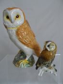 Two porcelain figures of Owls Beswick Owl and one smaller. (2)