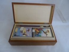Small lidded games box, containing in the top tray, two packs of playing cards, with Pheasants and
