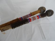 Pair of vintage Zulu drum sticks.