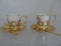 Limited edition Russian imperial porcelain two place coffee set comprising silver and gold metal