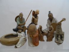 A collection of miscellaneous Oriental pottery and porcelain including figures depicting a