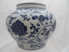 Blue and White Chinese Vase, depicting chrysanthemums, the vase having double rings to neck and
